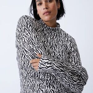 H&M Zebra Print Turtleneck Long Sleeve Top with flaw